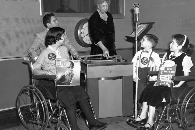 Eleanor Roosevelt acts as a disk jockey for children afflicted with polio on Jan. 13, 1957. The purpose of the broadcast was to generate interest in a series of talent shows nationwide benefiting the March of Dimes.